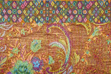 Brokar kumaş dokusu. çiçek desenle boyalı