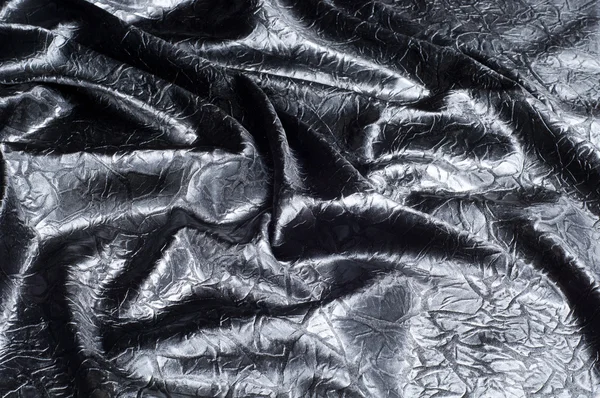 Fabric texture silk black. With gray spots. abstraction