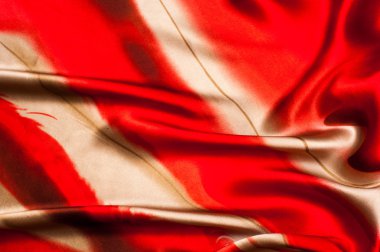 Kumaş renk soyutlama, bir desenle sarı, kırmızı. Fotoğraf stüdyosu