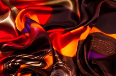 Kumaş renk soyutlama, bir desenle sarı, kırmızı. Fotoğraf stüdyosu