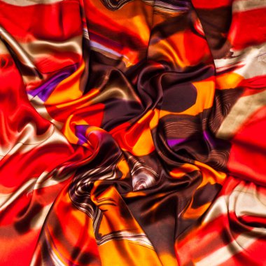 Kumaş renk soyutlama, bir desenle sarı, kırmızı. Fotoğraf stüdyosu