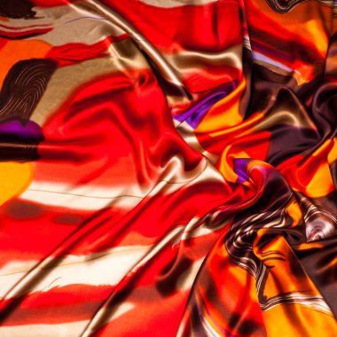 Kumaş renk soyutlama, bir desenle sarı, kırmızı. Fotoğraf stüdyosu