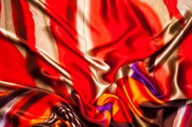 Kumaş renk soyutlama, bir desenle sarı, kırmızı. Fotoğraf stüdyosu