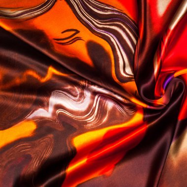 Kumaş renk soyutlama, bir desenle sarı, kırmızı. Fotoğraf stüdyosu