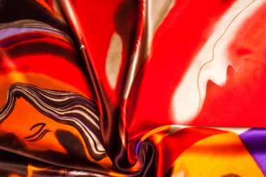 Kumaş renk soyutlama, bir desenle sarı, kırmızı. Fotoğraf stüdyosu