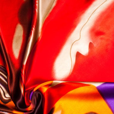 Kumaş renk soyutlama, bir desenle sarı, kırmızı. Fotoğraf stüdyosu