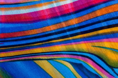 Kumaş ipek doku kahverengi, mavi, beyaz ve sarı. Fotoğraf stüdyosu