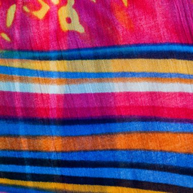 Kumaş ipek doku kahverengi, mavi, beyaz ve sarı. Fotoğraf stüdyosu