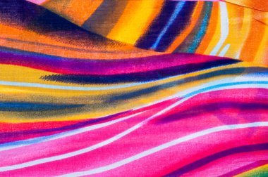 Kumaş ipek doku kahverengi, mavi, beyaz ve sarı. Fotoğraf stüdyosu