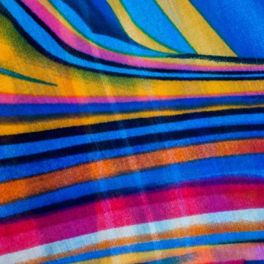 Kumaş ipek doku kahverengi, mavi, beyaz ve sarı. Fotoğraf stüdyosu