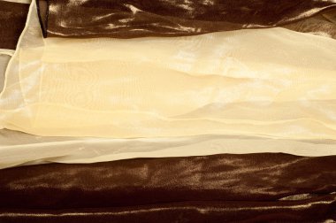 İpek kumaş dokusu, arka plan. Kahverengi ve krem çizgili