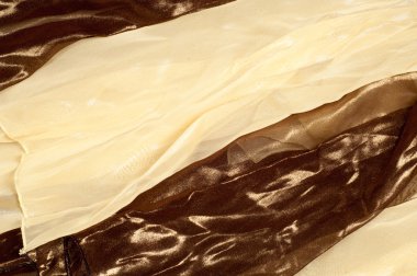 İpek kumaş dokusu, arka plan. Kahverengi ve krem çizgili