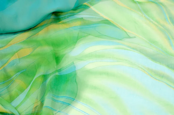 Текстура шовкової тканини, фон. зелений і жовтий колір — стокове фото