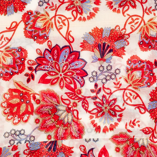 stock image The texture of the silk fabric, red flowers on a white background