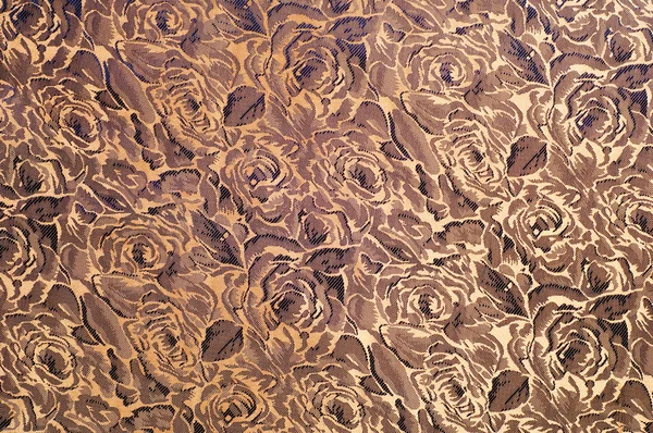 Fabric silk texture. Rose flowers, gold color. Photography studio