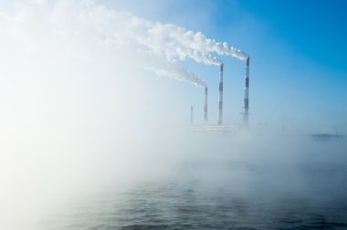CHP. birleştirilmiş ısı ve güç, bir sistem hangi buhar elektrik üretimi bir yan ürünü kullanılır gibi bir güç istasyonu üretilen ısı binalar yakın.