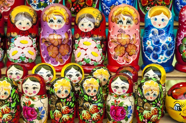 Colorful Russian nesting dolls at the market. These matryoshkas are a very popular souvenir among tourists. different in pattern and color matryoshka