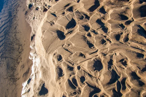 The texture of the sand. Sand in the wild nature