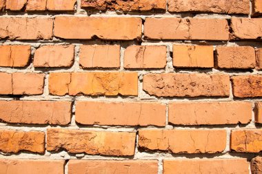 Tuğla duvar dokusu. Eski terk edilmiş duvar, tuğla inşa
