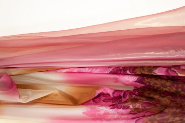 Pembe kumaş çiçek işlemeli. doku. Stüdyo fotoğrafı