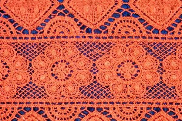 Červené krajkové textilie textura — Stock fotografie