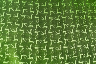 Kumaş renkleri yeşil, desenli doku geyik. Fotoğraf stüdyosu