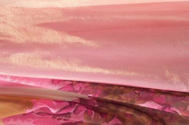 Pembe kumaş çiçek işlemeli. doku. Stüdyo fotoğrafı