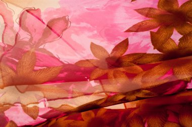 Pembe kumaş çiçek işlemeli. doku. Stüdyo fotoğrafı