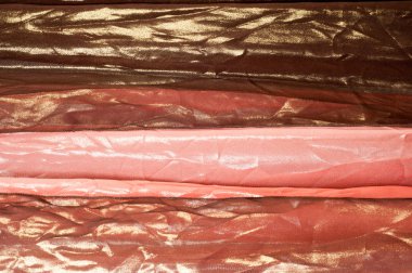 Pembe kahverengi şeffaf kumaş. doku. bornoz.