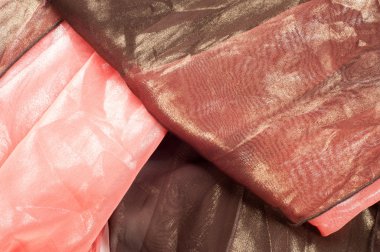 Pembe kahverengi şeffaf kumaş. doku. bornoz. Stüdyo fotoğrafı