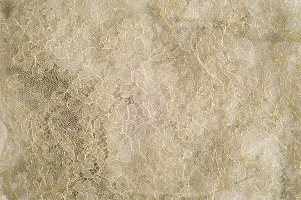 Текстура. кружева на ткани — стоковое фото