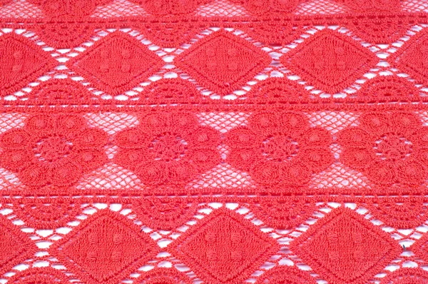 Červené krajkové textilie textura — Stock fotografie