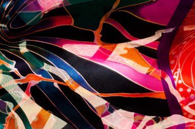 Kumaş ipek doku. soyut resim. bstract dalga deseni ipek batik üzerinde. iyi, güçlü, yumuşak, parlak elyaf koza yapımında silkworms tarafından üretilen ve iplik yapmak için toplanan