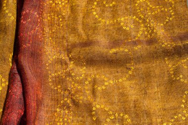 Doku yün kumaş sarı kırmızı altın