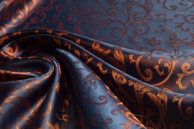 The texture of the silk fabric.