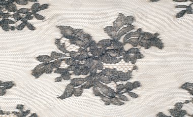 Doku dantel kumaş. dantel beyaz arka plan stüdyo üzerinde. ince kumaş iplik veya iş parçacığı yapılmış. genellikle bir pamuk veya ipek, döngü, büküm veya desenleri iplik örgü tarafından yapılmıştır