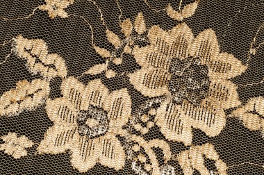 Doku dantel kumaş. dantel beyaz arka plan stüdyo üzerinde. ince kumaş iplik veya iş parçacığı yapılmış. genellikle bir pamuk veya ipek, döngü, büküm veya desenleri iplik örgü tarafından yapılmıştır