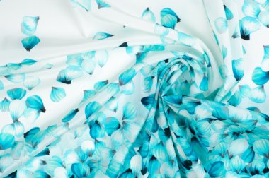 İpek kumaş dokusu. mavi çiçekler