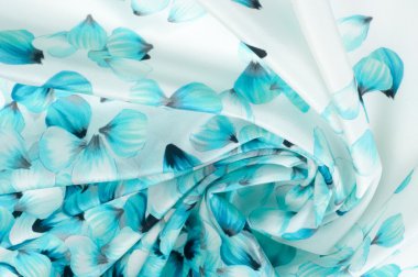 İpek kumaş dokusu. mavi çiçekler