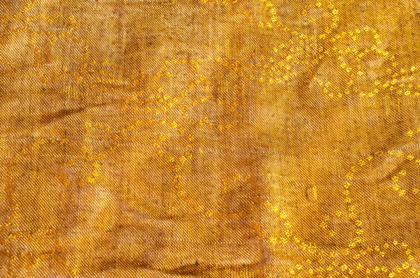 La trama del tessuto di lana giallo rosso dorato — Foto Stock