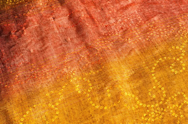 Tekstura wełna tkaniny żółty czerwony złoty — Zdjęcie stockowe