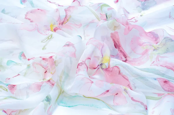 Fabric silk texture, painted with flowers — Stock Photo, Image