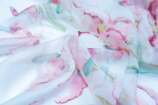 Fabric silk texture, painted with flowers — Stock Photo, Image