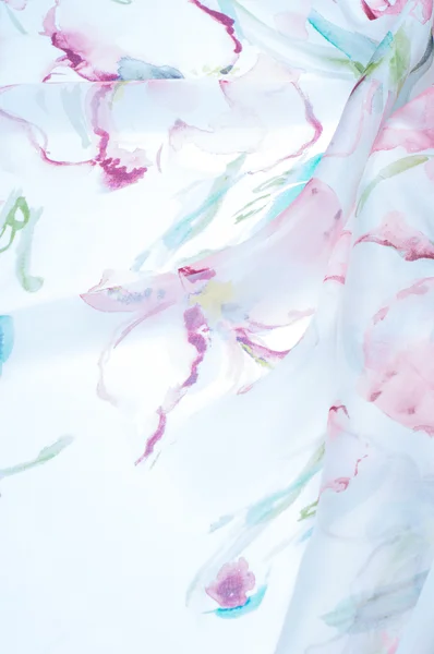 Fabric hedvábnou texturu, malované květy — Stock fotografie