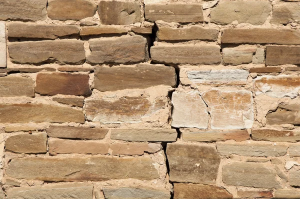 Textura. Pared forrada de piedra salvaje — Foto de Stock