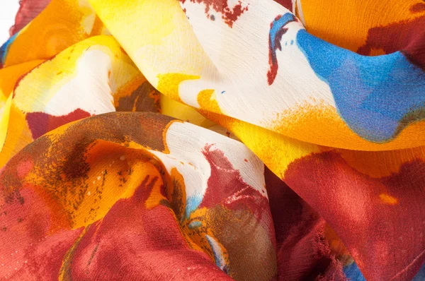 Kumaş ipek doku kahverengi, mavi, beyaz ve sarı — Stok fotoğraf