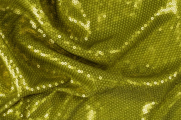 Stof textuur met groene pailletten — Stockfoto