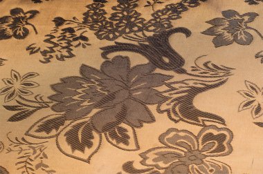 Kumaş ipek doku rengi Sandy Brown. İle dokuma kumaş çiçek içine