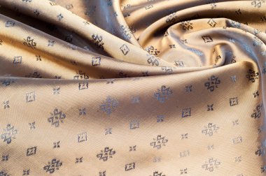 Kumaş ipek doku rengi Sandy Brown. İle dokuma kumaş çiçek içine