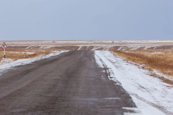 Winter road in the desert — Stock Photo, Image